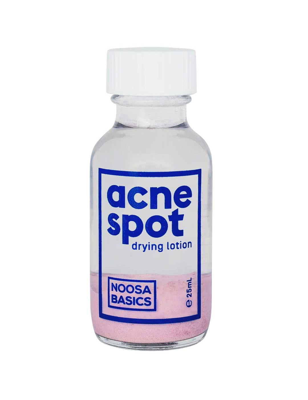 Noosa Basics Acne Spot Drying Lotion is a clear glass bottle with pink sediment, white liquid, a white cap, and a blue-and-white label—an effective natural spot treatment made with plant-derived ingredients.