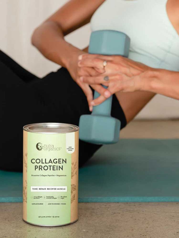 A person exercises with a blue dumbbell on a yoga mat as a can of Nutra Naturals Collagen Protein Unflavoured, featuring hydrolysed collagen peptides for tone and muscle recovery, sits in the foreground.