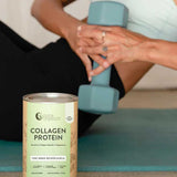 A person exercises with a blue dumbbell on a yoga mat as a can of Nutra Naturals Collagen Protein Unflavoured, featuring hydrolysed collagen peptides for tone and muscle recovery, sits in the foreground.