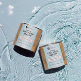 Two jars of Nutra Naturals Marine Collagen Beauty Unflavoured 225g, with kraft paper labels in white, gold, and pink accents, sit on clear rippling water as sunlight shimmers around them.