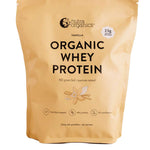 A beige pouch of Nutra Naturals Organic Whey Protein Vanilla 750g, made from grass-fed New Zealand dairy, displays details like 23g protein per serve and various certification icons on the front.