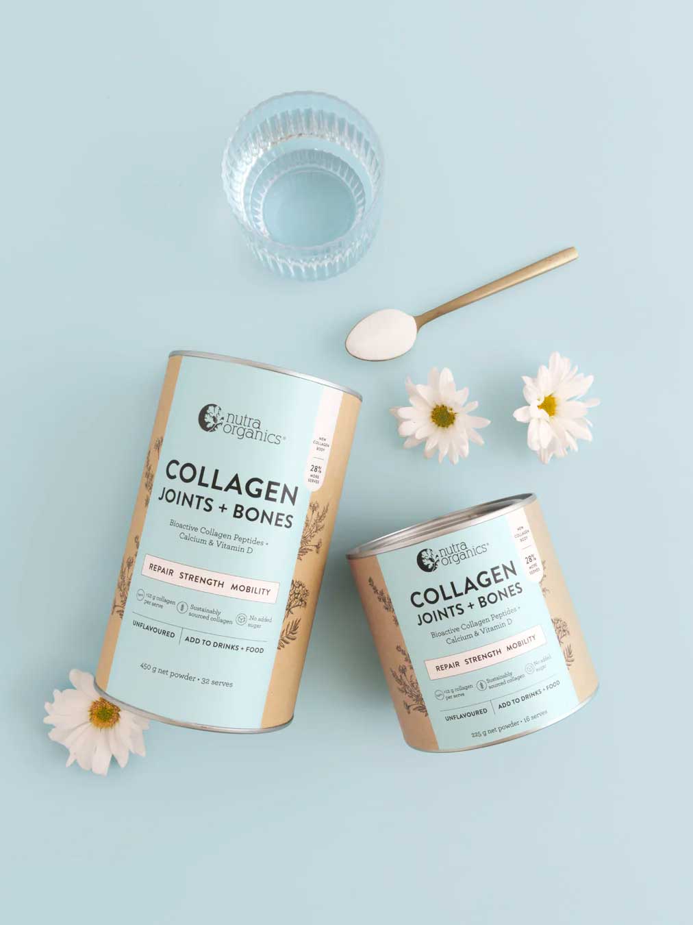 Two containers of Nutra Naturals Collagen Joints + Bones, a glass of water, a gold spoon with collagen powder, and three white daisies are arranged on a light blue background.