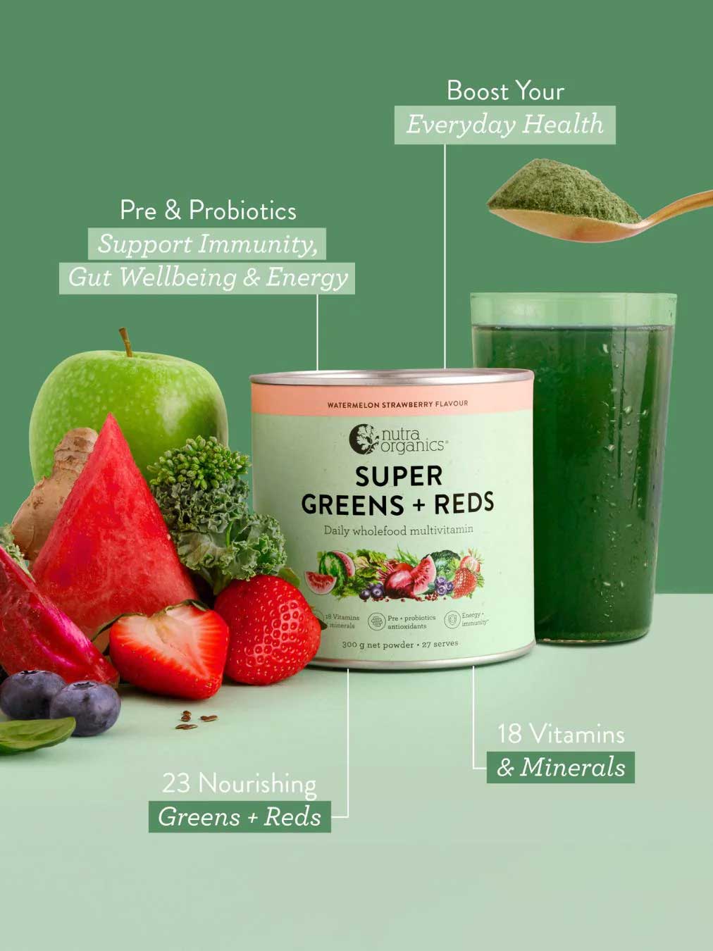 A container of Nutra Naturals Super Greens + Reds Watermelon Strawberry 300g sits beside a glass of vibrant green drink and fresh produce, with text showcasing its superfoods that support gut health and overall wellness.
