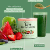 A container of Nutra Naturals Super Greens + Reds Watermelon Strawberry 300g sits beside a glass of vibrant green drink and fresh produce, with text showcasing its superfoods that support gut health and overall wellness.