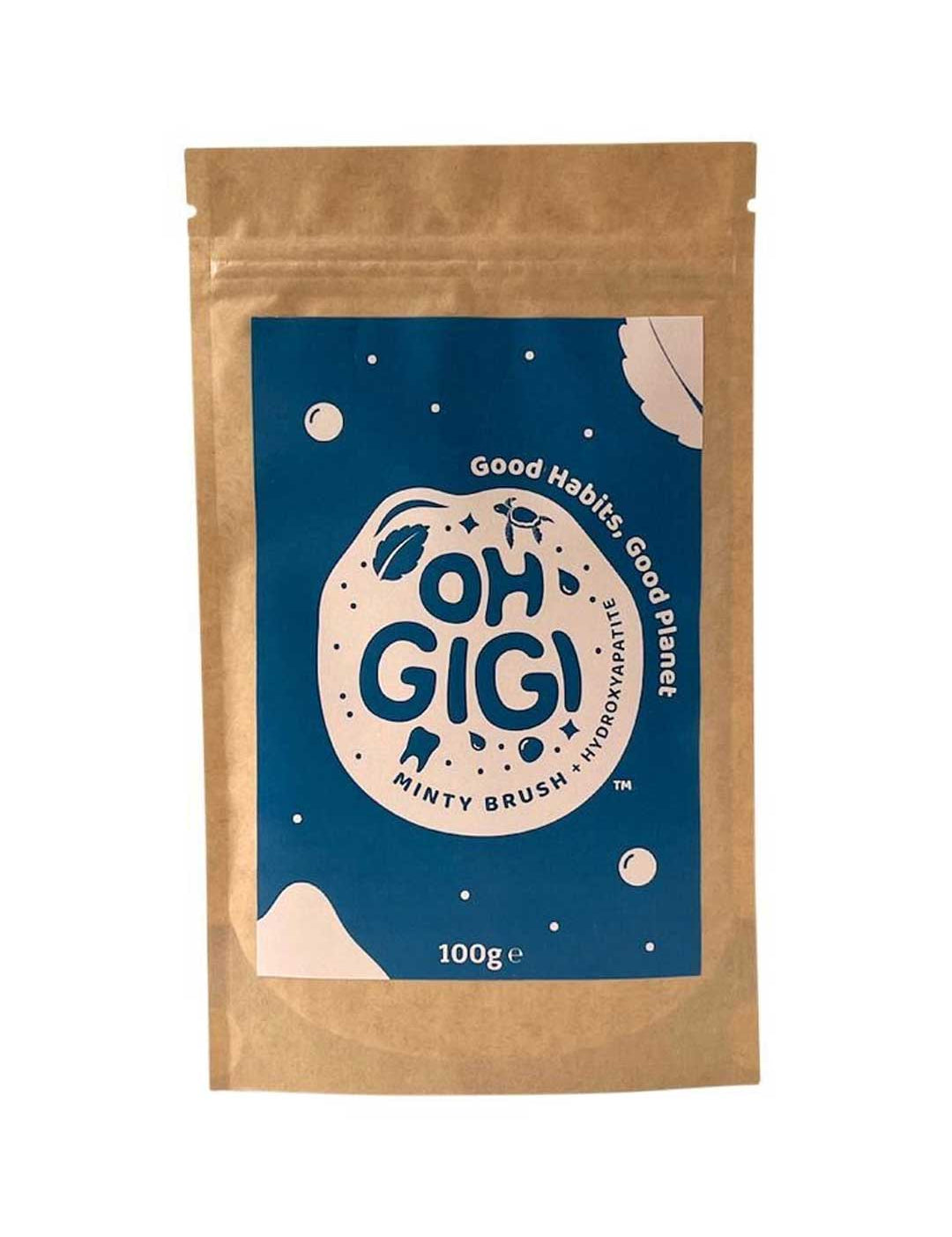 Kraft paper packaging with blue label featuring Oh Gigi Hydroxyapatite Tooth Powder 100g Refill - Minty Brush on a white background