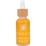 A 30ml glass bottle of Orgaid Organic Face Oil Amaranth Squalene with a wooden dropper cap contains yellow-orange amaranth squalene, features a white floral design, and has "Amaranth Squalene" labeled on the front.