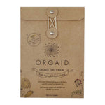 A brown paper package of Orgaid Organic Sheet Mask Anti-Aging & Moisturising 4pk features floral art, a string closure, and highlights hyaluronic acid plus natural, organic ingredients.