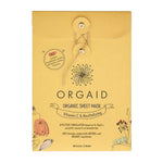 Front of Orgaid Organic Sheet Mask Vitamin C & Revitalising 4pk shows yellow packaging with floral illustrations and text highlighting natural ingredients like vitamin C and hyaluronic acid.