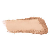 A swatch of 100% Pure Rice Powder Foundation 9g in Peach Bisque, a light peach-beige shade, features a smooth center with loose powder around the edges.