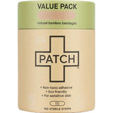 Cylindrical brown cardboard PATCH Natural Bamboo Bandages value-pack tube with a pale green top band and a large black-outlined cross on the front.