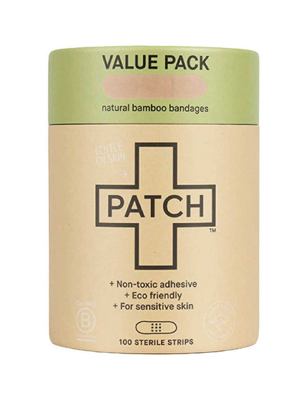 Cylindrical brown cardboard PATCH Natural Bamboo Bandages value-pack tube with a pale green top band and a large black-outlined cross on the front.