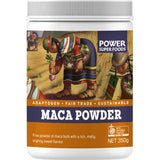 A white jar labeled Power Super Foods Certified Organic Maca Powder shows people harvesting maca roots. The label highlights its Peruvian adaptogen status, Fair Trade certification, and sustainability. Net weight: 350g.