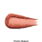 A swatch of 100% Pure Fruit Pigmented® Blush 9g by 100% Pure in the shade Pretty Naked, shown on a white background. This pink-toned powder blush has a smooth texture, ideal for a natural flush on cheeks.