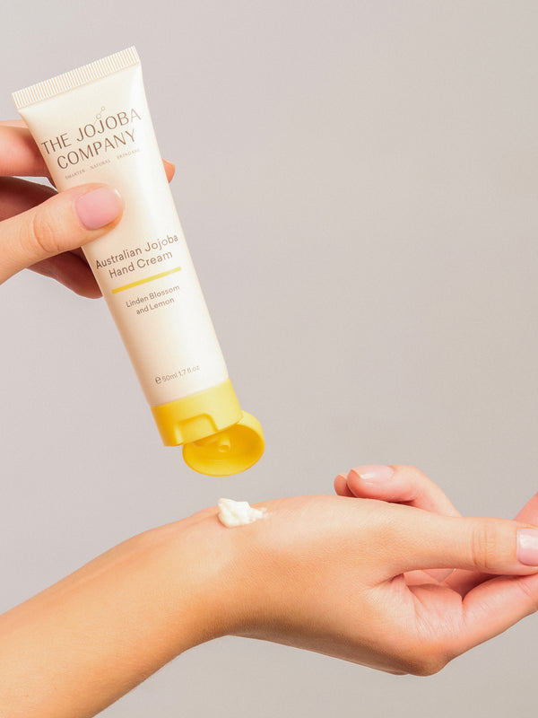 The Jojoba Company Australian Jojoba Hand Cream tube with a dab of cream