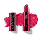 A bright pink, moisturising lipstick with a dark metallic case is shown upright beside its cap and a pink smear. Text below: Primrose (a bright pink) 100% Pure Pomegranate Oil Moisturising Lipstick 4.5g.