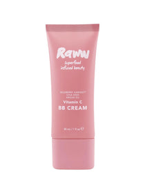 A pink tube of RAWW Vitamin C BB Cream 30ml, infused with Wildberry Harvest, Chia Seed, and Argan Oil for a luminous complexion, stands upright against a white background.