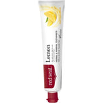 Slender white Red Seal Lemon toothpaste tube standing on a small red cap, with a red logo panel, black lettering and a yellow lemon wedge near the top.
