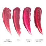 Four shades of Luk Beautifood Lip Nourish Lipsticks 3g are swatched on a white background, labeled left to right: Ruby Grapefruit, Rosé, Cherry Plum, and Cranberry Citrus.