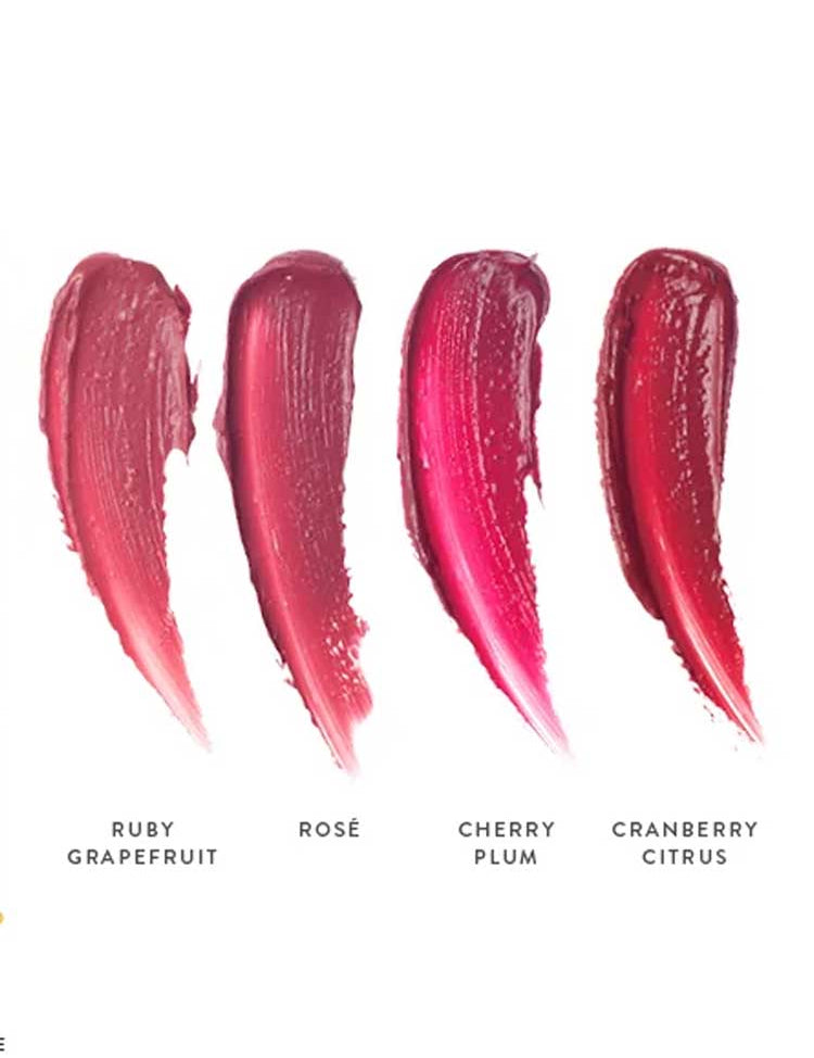 Four shades of Luk Beautifood Lip Nourish Lipsticks 3g are swatched on a white background, labeled left to right: Ruby Grapefruit, Rosé, Cherry Plum, and Cranberry Citrus.