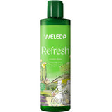 A green bottle of Weleda Refresh Citrus Body Wash, a natural wash with zesty citrus and lemon oil, features cyclist and countryside illustrations. Text highlights its refreshing scent and 400 ml capacity.