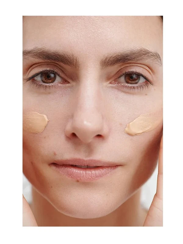 Model using Dr Hauschka Regenerating Day Cream Complexion