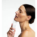 Model with Dr Hauschka Regenerating Neck and Decollete Cream