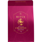 Deep pink resealable Ritua Creatine Monohydrate Strength For Women pouch with fine flowing line patterns, a gold-outlined label and a round gold emblem above the product name.
