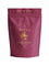 A maroon pouch labeled "Ritua Creatine Monohydrate Strength For Women" with gold text and a female athlete illustration emphasizes muscle recovery and strength, and contains 300 grams.