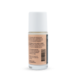 Back of a clear Noosa Basics Coconut and Vanilla roll-on deodorant bottle with a white cap, showing small black directions and product information beside a barcode on its peach label.