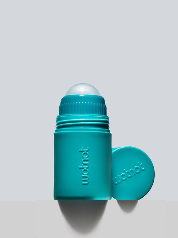 Open Wotnot refillable sunscreen roll-on applicator