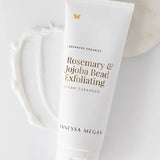 Vanessa Megan Rosemary and Jojoba Bead Exfoliating Cleanser tube held in hand