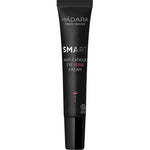 A black tube of Madara SMART Anti-Fatigue Eye Rescue Cream 15ml with white and red text stands upright against a plain white background—designed to reduce puffiness and dark circles.