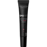 A black tube of Madara SMART Anti-Fatigue Eye Rescue Cream 15ml with white and red text stands upright against a plain white background—designed to reduce puffiness and dark circles.