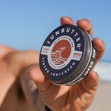 SunButter Tinted Sunscreen SPF50 held in hand