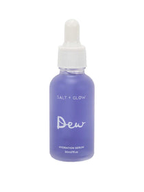 A frosted purple glass dropper bottle of Salt + Glow Dew Hydration Serum 30ml, formulated with hyaluronic acid to hydrate dry skin, stands upright against a white background.