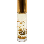 Salt + Glow Elixir Roll on Perfume - Restored (Frankincense & Chamomile) 10ml is a handmade vegan fragrance in a small clear bottle with gold flakes. Relaxing aromatherapy benefits come from soothing frankincense and chamomile oils.