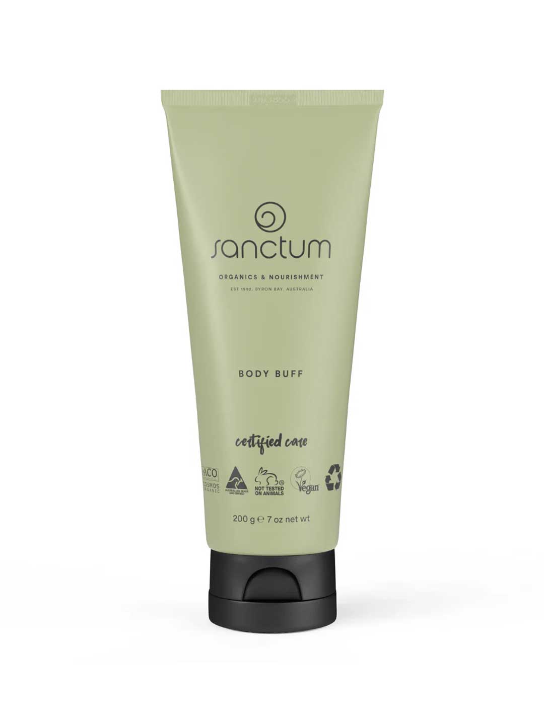 A green 200g Sanctum Body Buff tube stands upright with vegan, cruelty-free, and recyclable certifications on it. The tube features a black flip-top cap and the Sanctum brand label.
