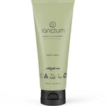 A green 200g Sanctum Body Buff tube stands upright with vegan, cruelty-free, and recyclable certifications on it. The tube features a black flip-top cap and the Sanctum brand label.