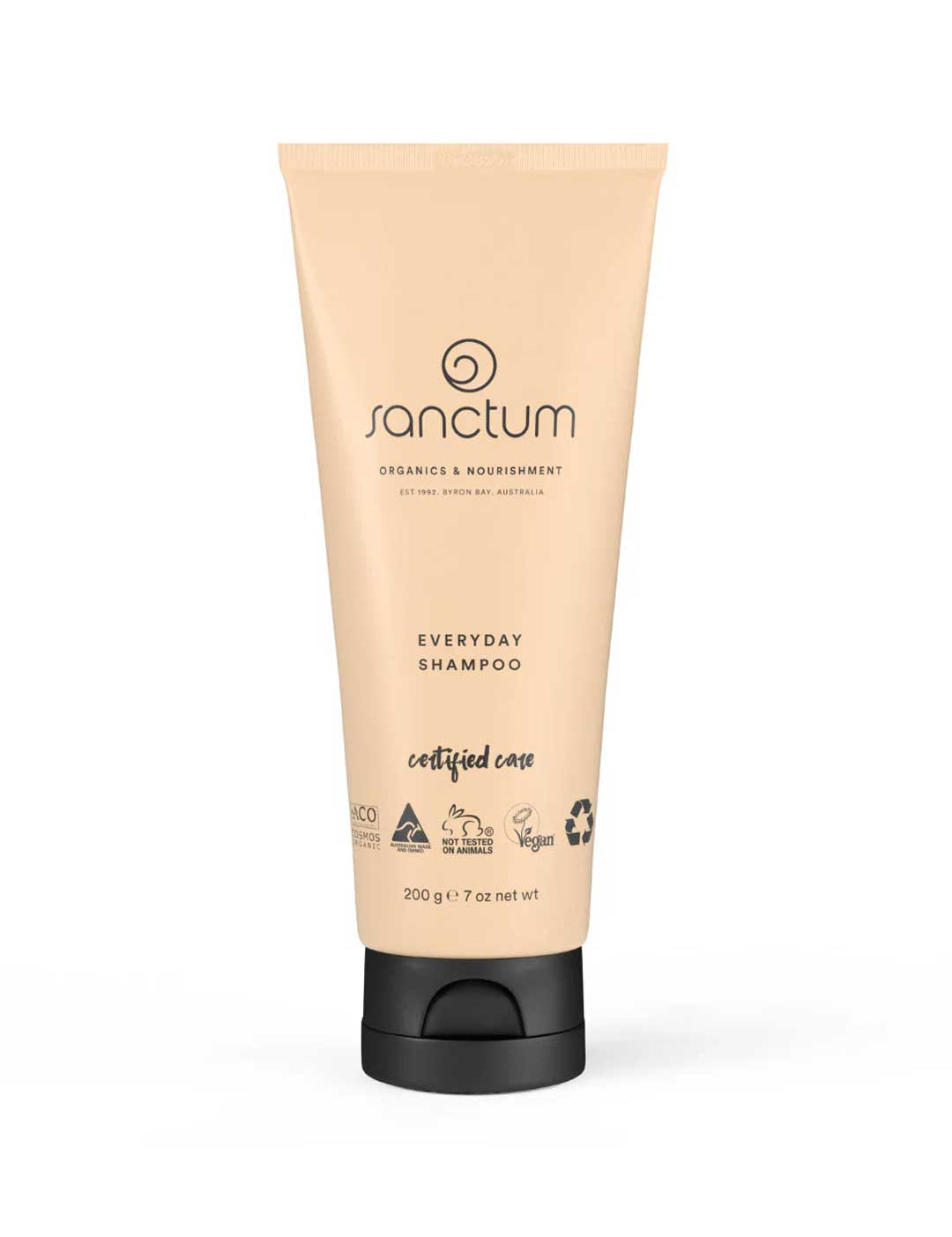 A beige tube of Sanctum Everyday Shampoo 200g with a black flip cap, featuring eco-friendly, vegan, and cruelty-free certification logos.