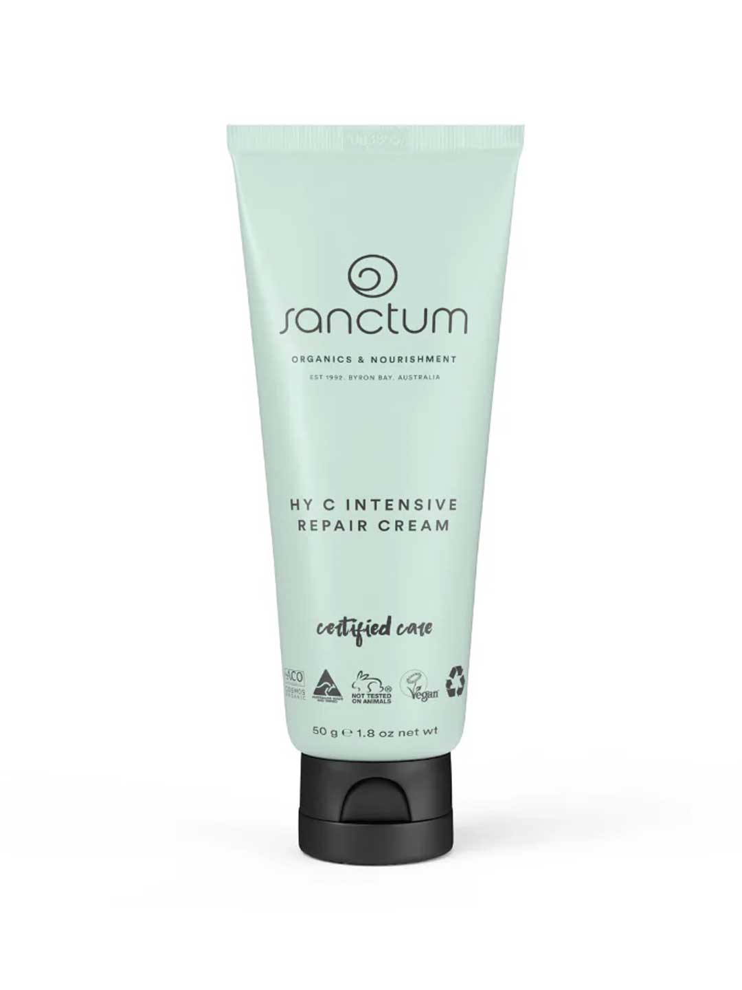 A 50g light green tube of Sanctum HY C Intensive Repair Cream, displaying black text and organic, vegan, and recyclable certifications, stands upright on a white background.