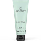 A 50g light green tube of Sanctum HY C Intensive Repair Cream, displaying black text and organic, vegan, and recyclable certifications, stands upright on a white background.