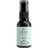 A dark amber pump bottle labeled Sanctum HY C Recovery Serum 30g features a light green label with certification and recycling symbols. This organic Vitamin C serum from Sanctum offers anti-aging benefits for natural skincare.