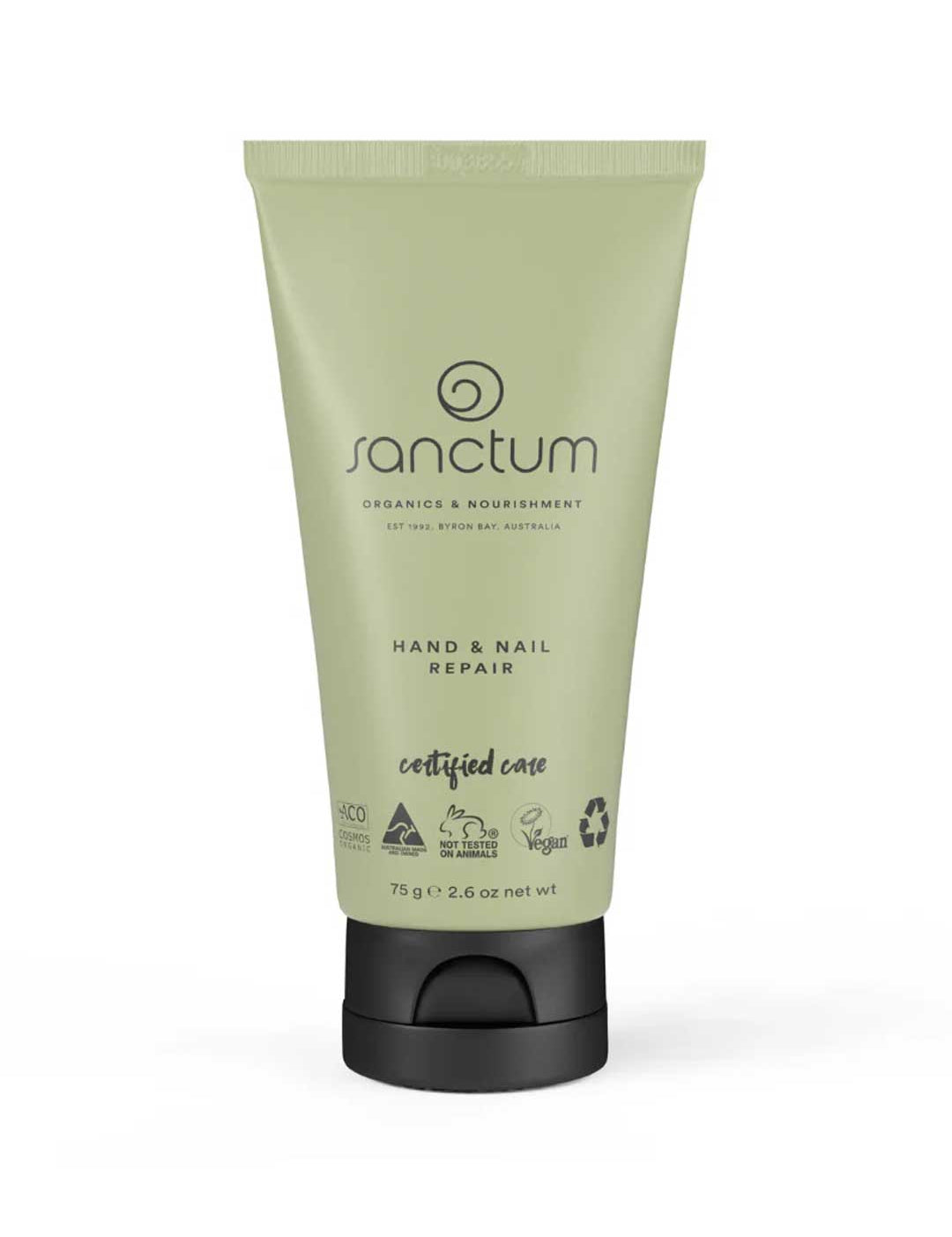 A green tube of Sanctum Hand & Nail Repair 75g with a black cap; this vegan, cruelty-free, recyclable cream nourishes hands and nails.