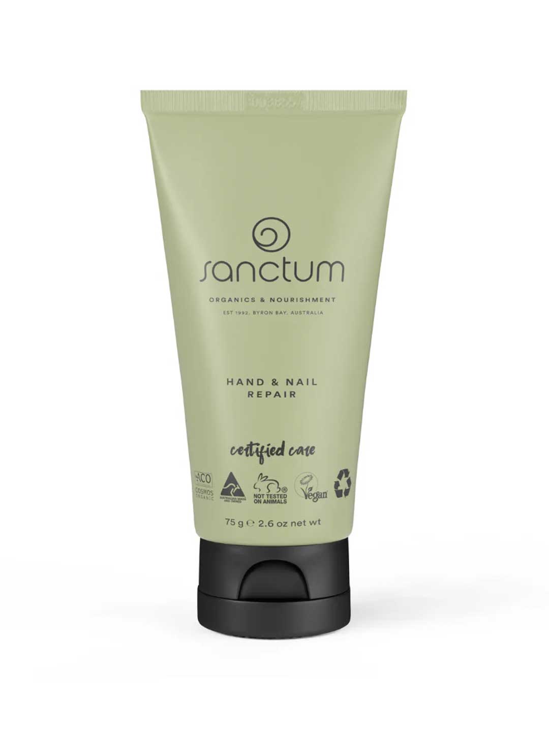 A green tube of Sanctum Hand & Nail Repair 75g with a black cap; this vegan, cruelty-free, recyclable cream nourishes hands and nails.