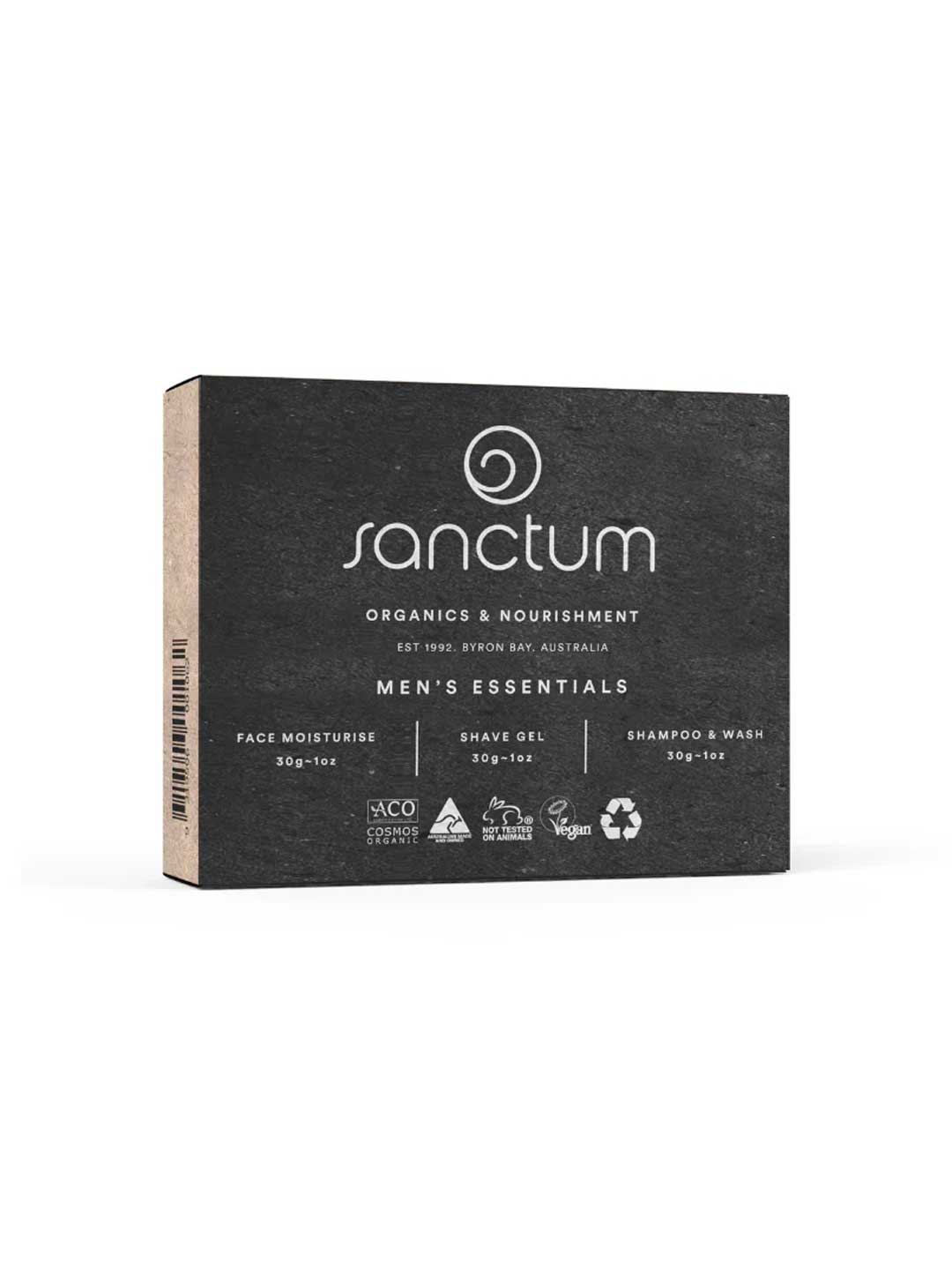 The Sanctum Men Essential 3 Piece Set comes in a black box with white text, including face moisturiser, shave gel, and shampoo & wash. The packaging highlights its organic, vegan, and cruelty-free certifications.