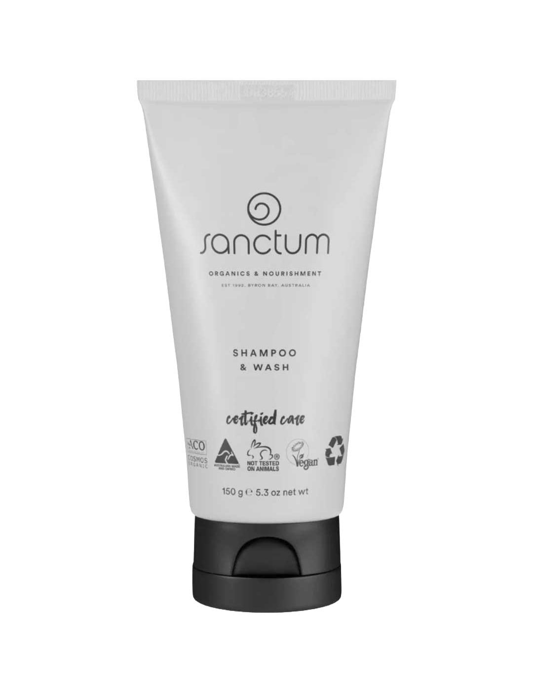 A white tube of Sanctum Men's Shampoo & Wash 150g with black text and cap. This certified organic, vegan, and cruelty-free product is suitable for hair and body and comes in recyclable packaging.