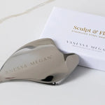 Vanessa Megan Sculpt and Flow Stainless Steel Gua Sha with its box