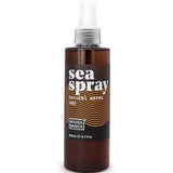 Bottle of sea spray with a label on a white background