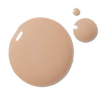 Three drops of 100% Pure 2nd Skin Serum Foundation 35ml in Shade 6 sit on a white background—the largest leftmost, two smaller to the right—highlighting the brand’s lightweight, seamless natural finish.