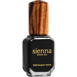 A bottle of Sienna Byron Bay Nail Polish in Onyx, featuring a wooden cap, is shown against a white background.